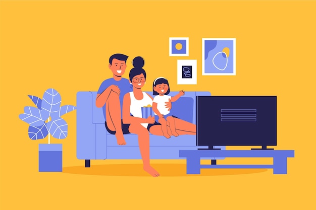 Family watching a movie at home | Free Vector