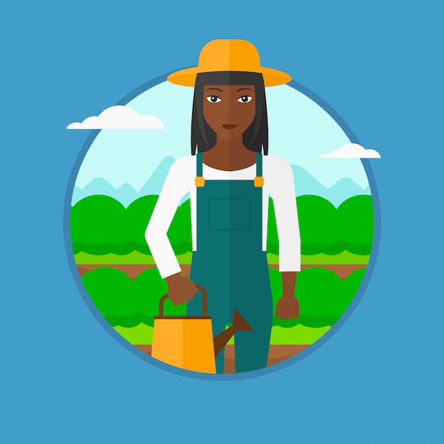 Farmer with watering can at cabbage field. Premium Vector