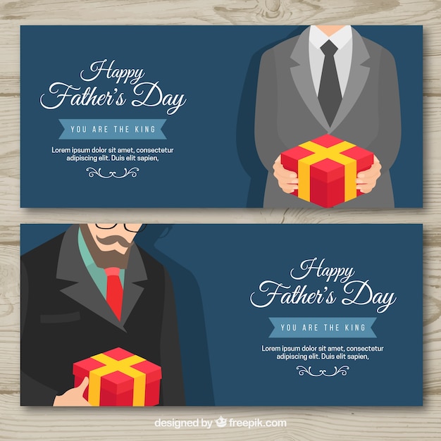 Fathers day banners with man holding\
present