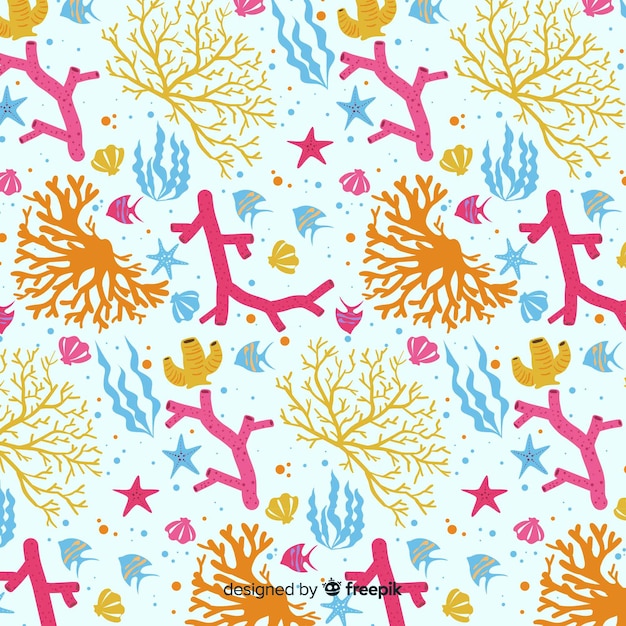 Flat colorful coral and fishes pattern pack Free Vector