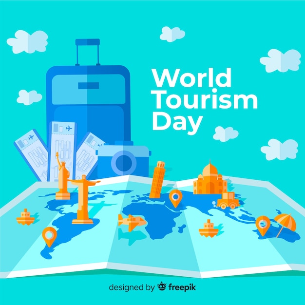 Flat world tourism day with luggage and map Free Vector