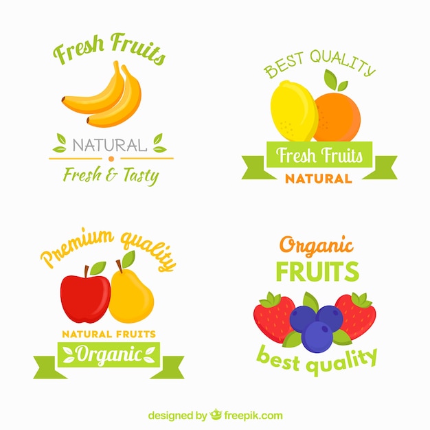 Four fruit labels in flat design | Free Vector