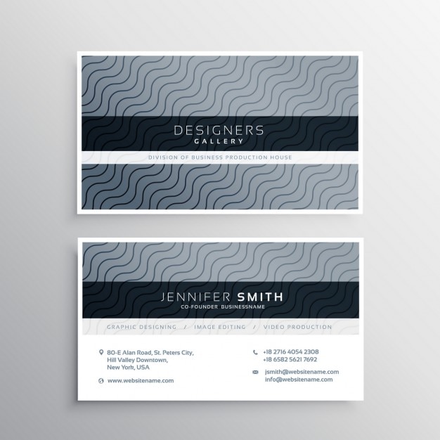 Gray business card with elegant\
ornaments