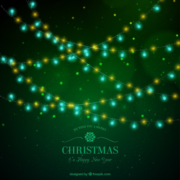 Free Vector | Green background with christmas lights