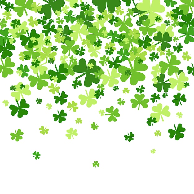 Premium Vector | Green shamrocks falling background