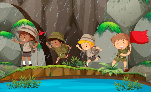 Group of boy scout in nature Premium Vector