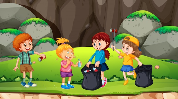Group of kids picking up rubbish Free Vector