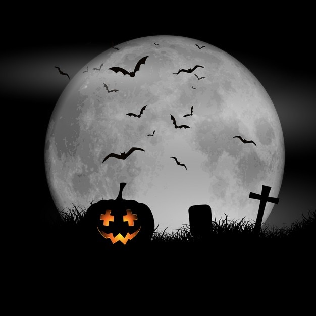 Free Vector | Halloween background with pumpkin against a moonlit sky