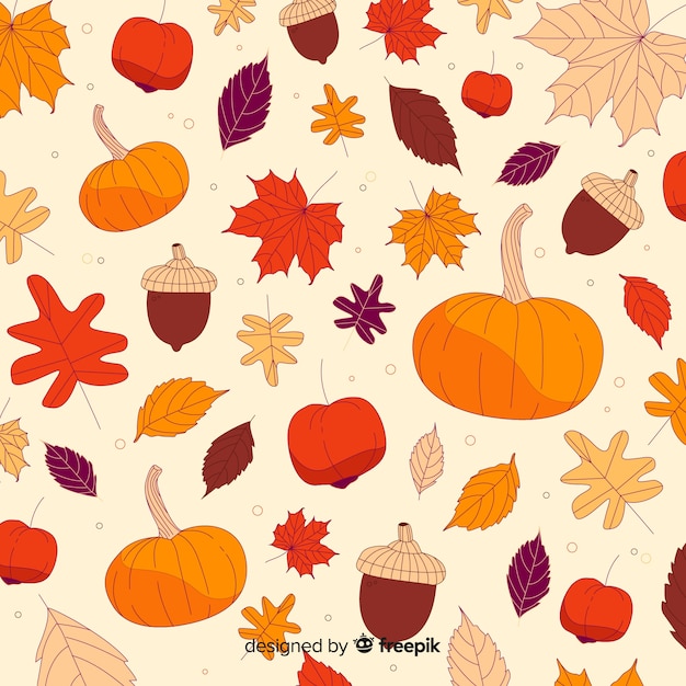 Hand drawn autumn forest leaves background Free Vector