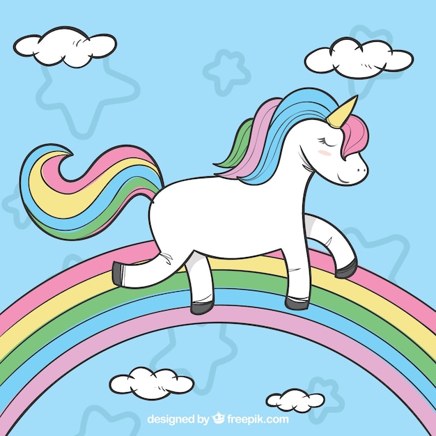 Download Hand drawn background of unicorn with rainbow | Free Vector