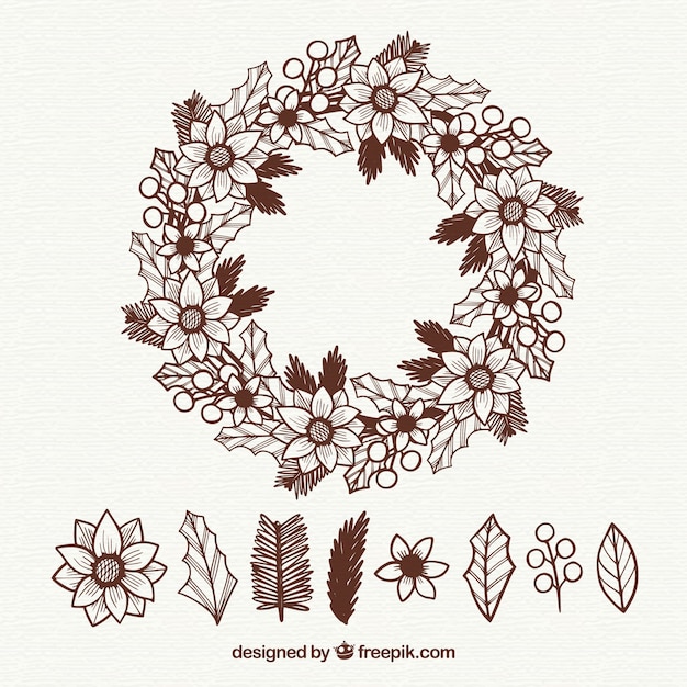 Free Vector | Hand drawn christmas wreath with a set of leaves