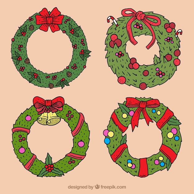 Free Vector | Hand drawn christmas wreaths