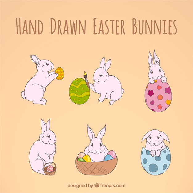 Premium Vector | Hand drawn easter bunnies