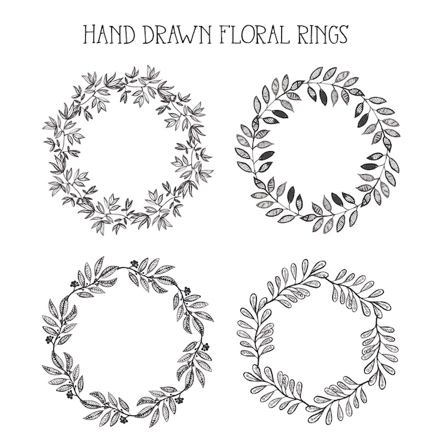 Download Hand drawn floral rings Vector | Premium Download