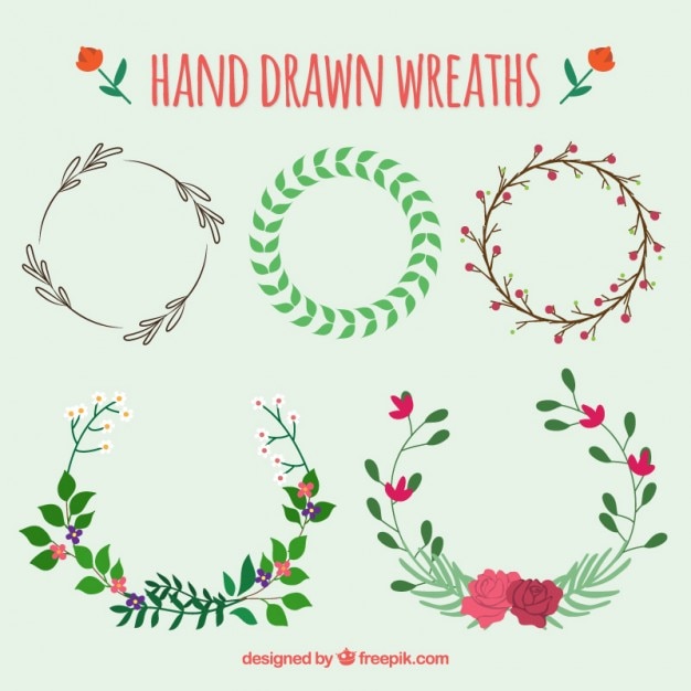 Premium Vector | Hand drawn floral wreaths