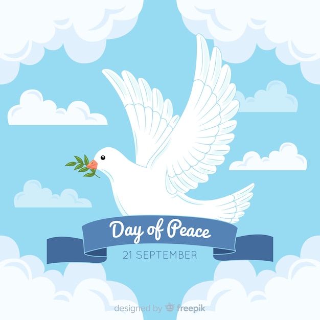鳩とリボンで手描きの平和の日 無料のベクター