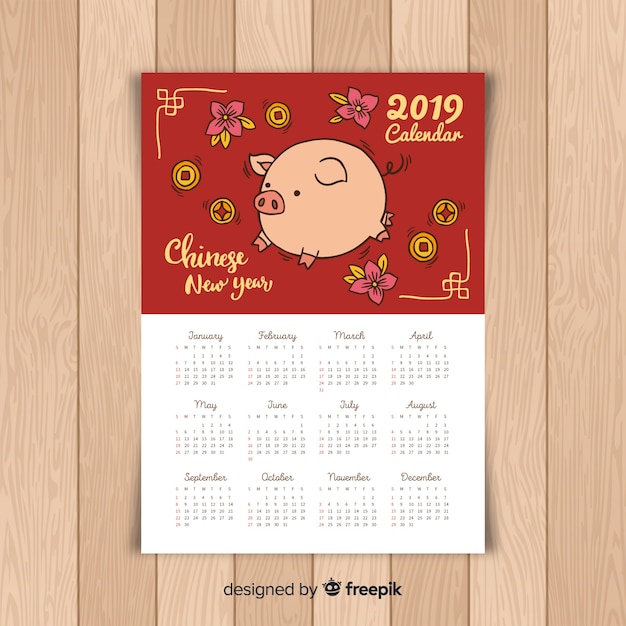 Free Vector Hand drawn pig chinese new year calendar