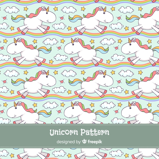 Hand drawn unicorn pattern Free Vector