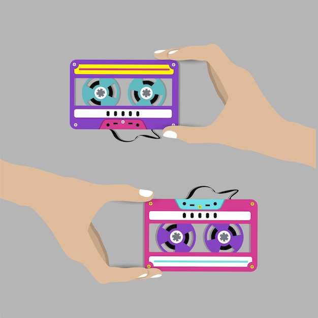 Premium Vector | Hand holding cassette. illustration.