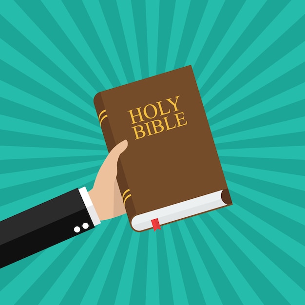 Premium Vector | Hand holding holy bible