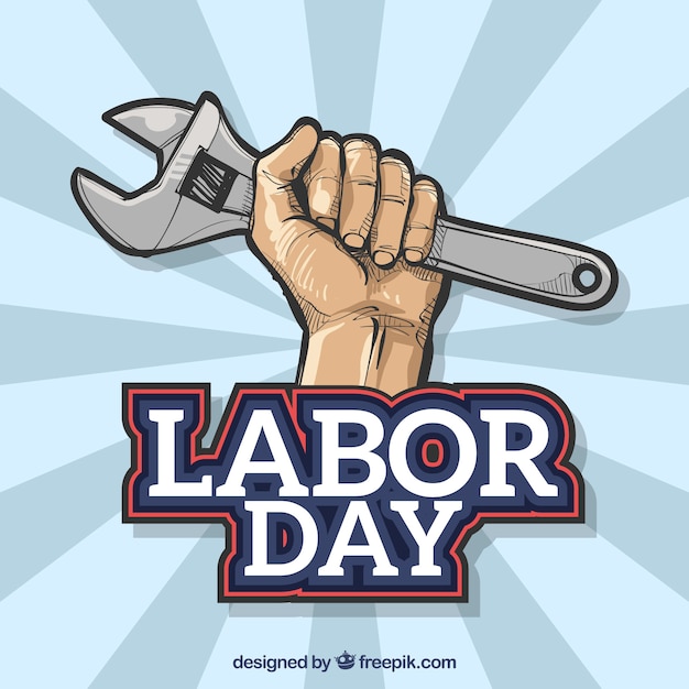 Hand retro background with wrench for labor\
day