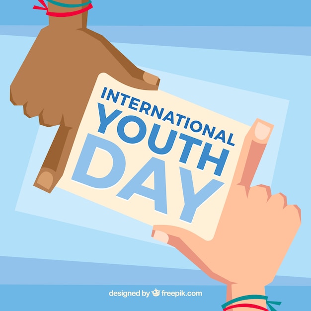Hands with note of international youth day background