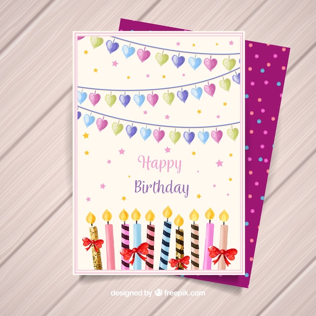 Happy birthday card with balloons and candles\
in watercolor style