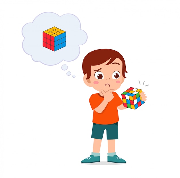 Happy Cute Little Kid Boy Play Rubik Cube Premium Vector