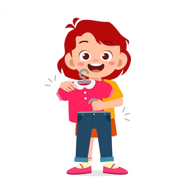 Happy cute little kid girl choose clothes | Premium Vector