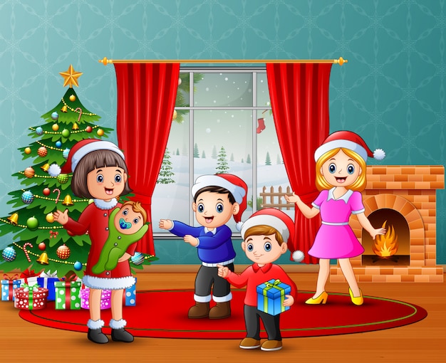 Download Happy family celebration a christmas in the living room Vector | Premium Download