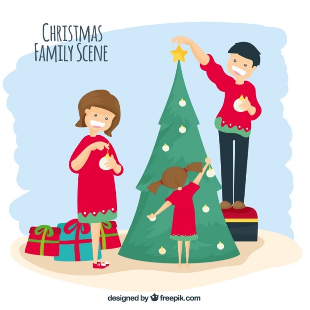 Download Happy family decorating the christmas tree | Free Vector