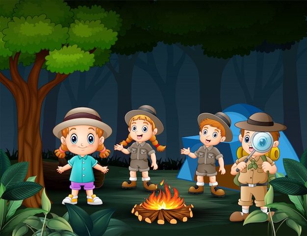 Premium Vector Happy Kids Camping In The Forest At Night Near Big Fire