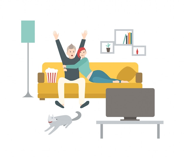 幸せな男と女が快適なソファに座って ポップコーンを食べ テレビでスポーツゲームを見て 自宅で一緒に時間を過ごすかわいい若い夫婦 フラット漫画のカラフルな イラスト プレミアムベクター