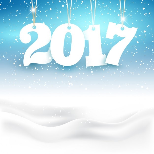 Happy new year background with hanging numbers\
in a snowy landscape