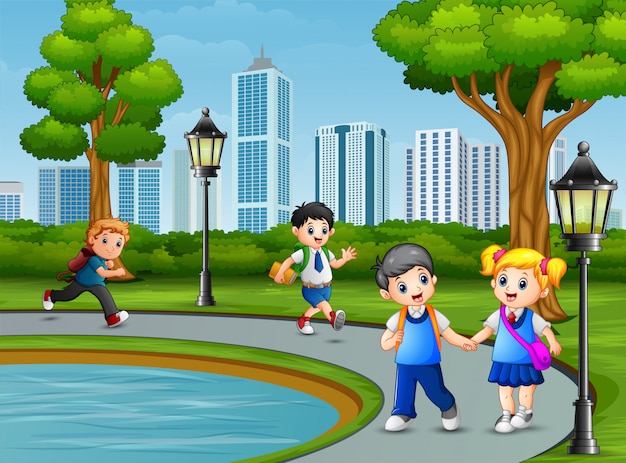 Happy school children in the city park | Premium Vector