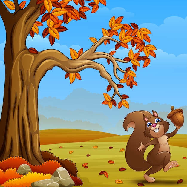 Premium Vector | Happy squirrel holding an acorn in the autumn forest