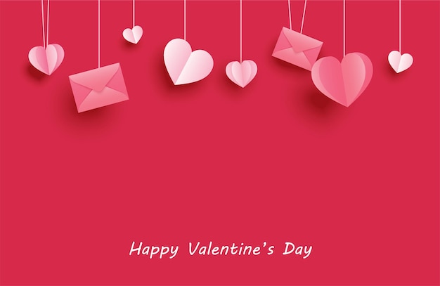 赤いパステルカラーの背景に掛かっている紙のハートと幸せなバレンタインデーのグリーティングカード プレミアムベクター