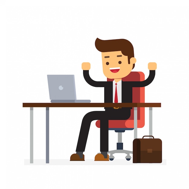 Happy Young Man Sitting At His Desk Premium Vector