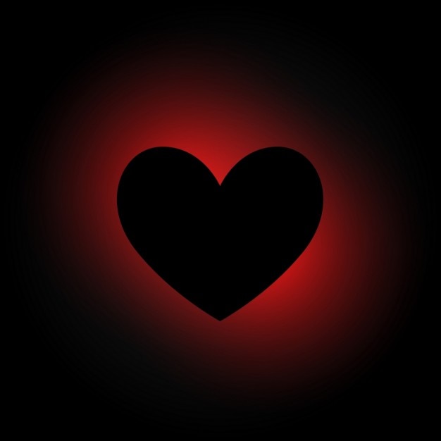 Heart in dark background Vector | Free Download