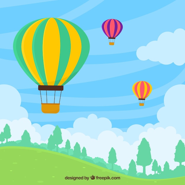 Hot air balloons background in the sky with
clouds