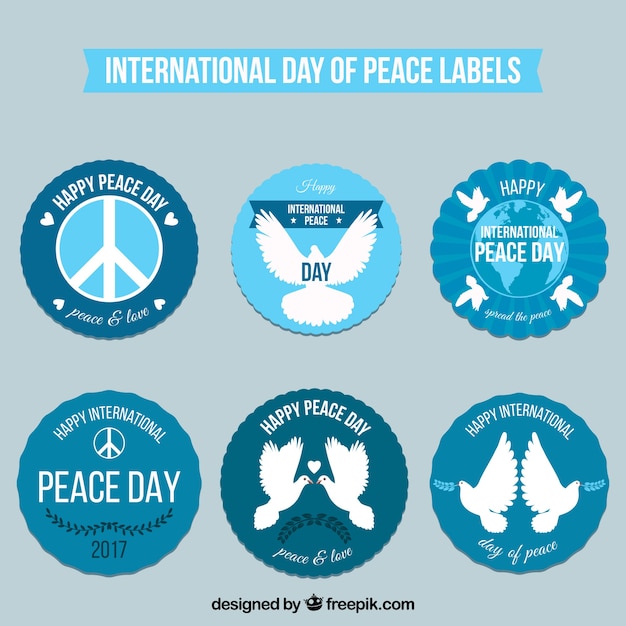 Labels with doves and peace symbols