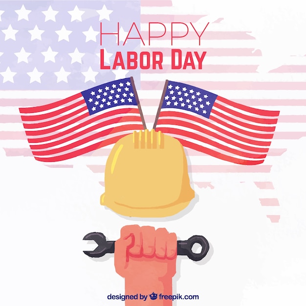 Labor day background with hand holding\
wrench