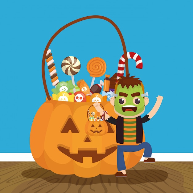 Download Little boy with frankenstein disguise and candies pumpkin Vector | Free Download