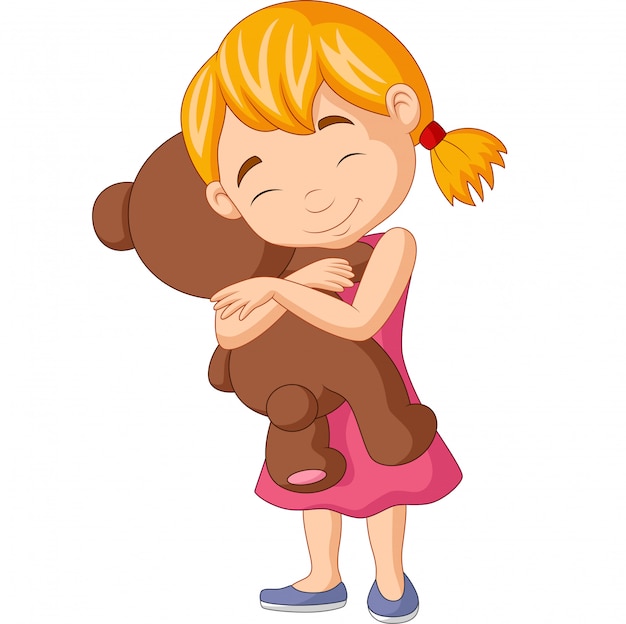 little girl hugging teddy bear