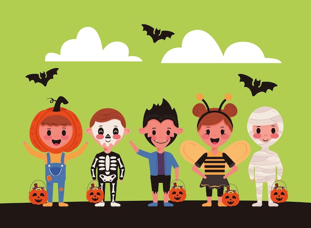 ハロウィーンの衣装のキャラクターとコウモリが飛んでいる小さな子供たち プレミアムベクター