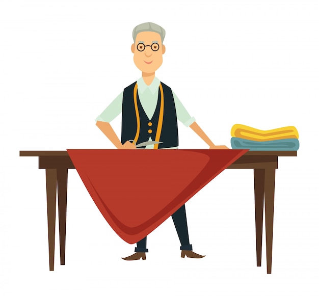 Male designer works on new outfit at table Premium Vector