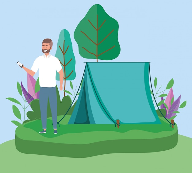 Download Man with smartphone tent camping picnic forest | Premium ...