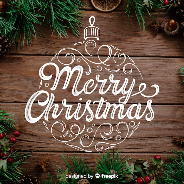 Merry christmas concept with lettering Free Vector