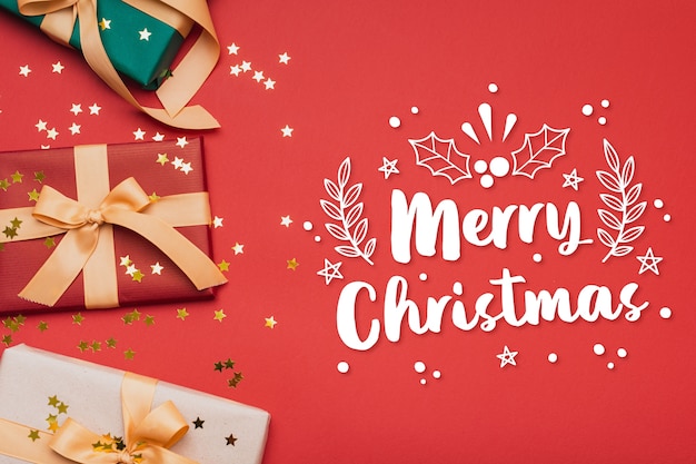 Merry christmas lettering on christmas photo | Free Vector