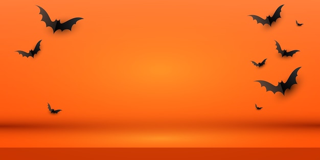 黒い紙コウモリの群れと最小限の創造的なオレンジ色の背景レイアウトデザイン コピースペース付き プレミアムベクター